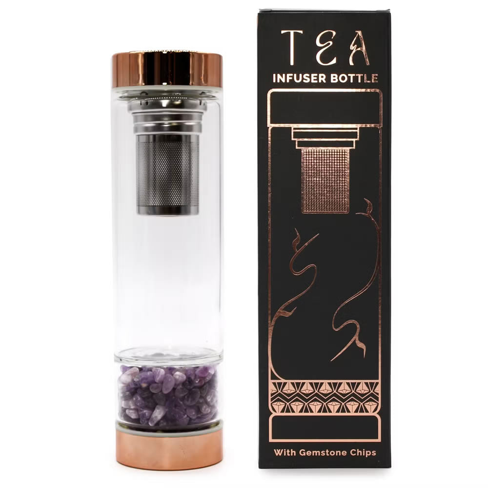 Clear tea infuser bottle with copper accents and packaging on a white background