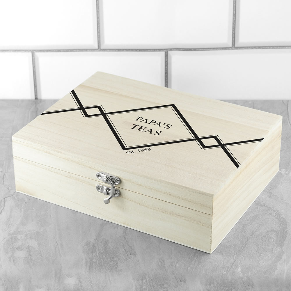 Wooden tea box with 'Papa's Teas' branding on a tiled wall background