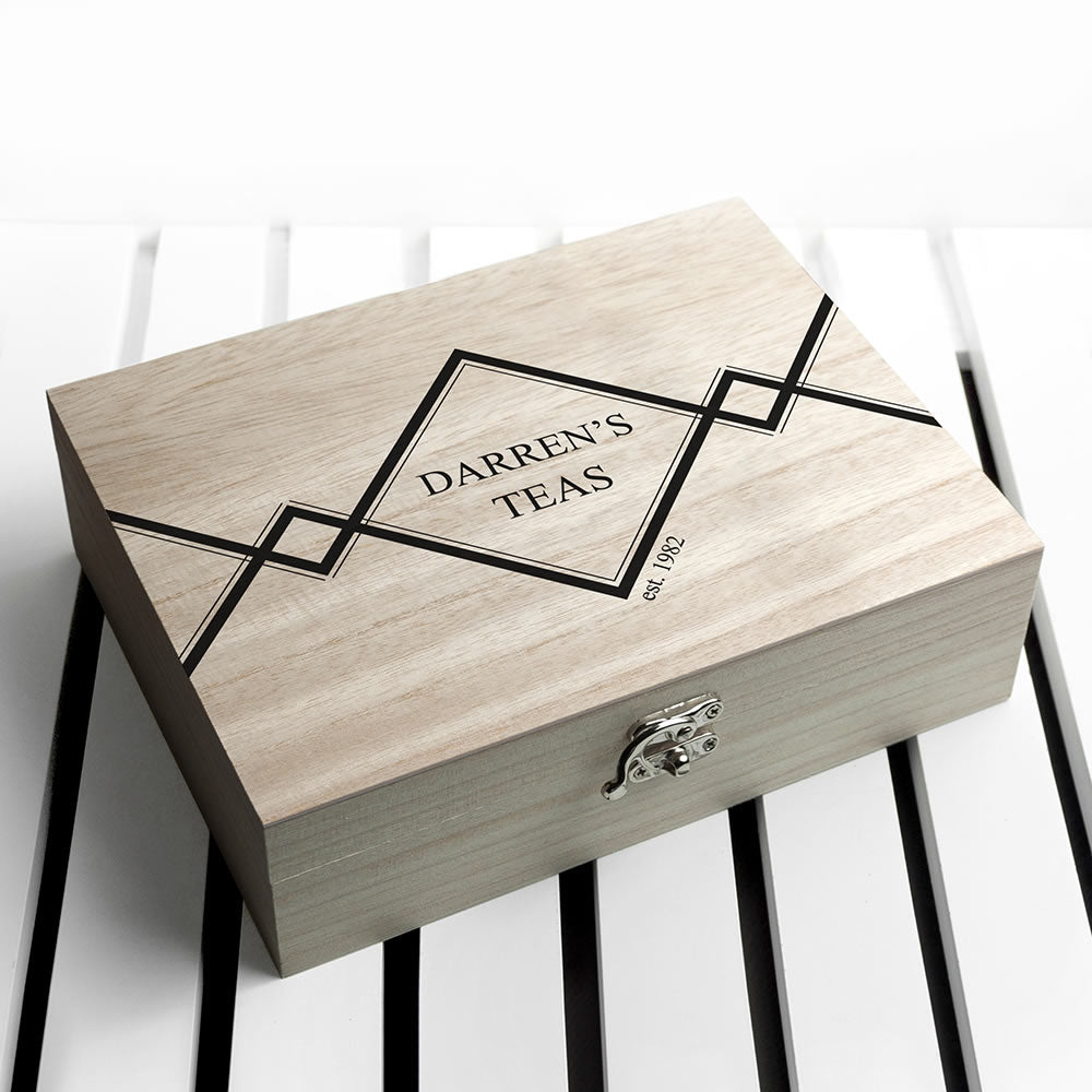Wooden tea box with 'Darren's Teas' branding on a white background