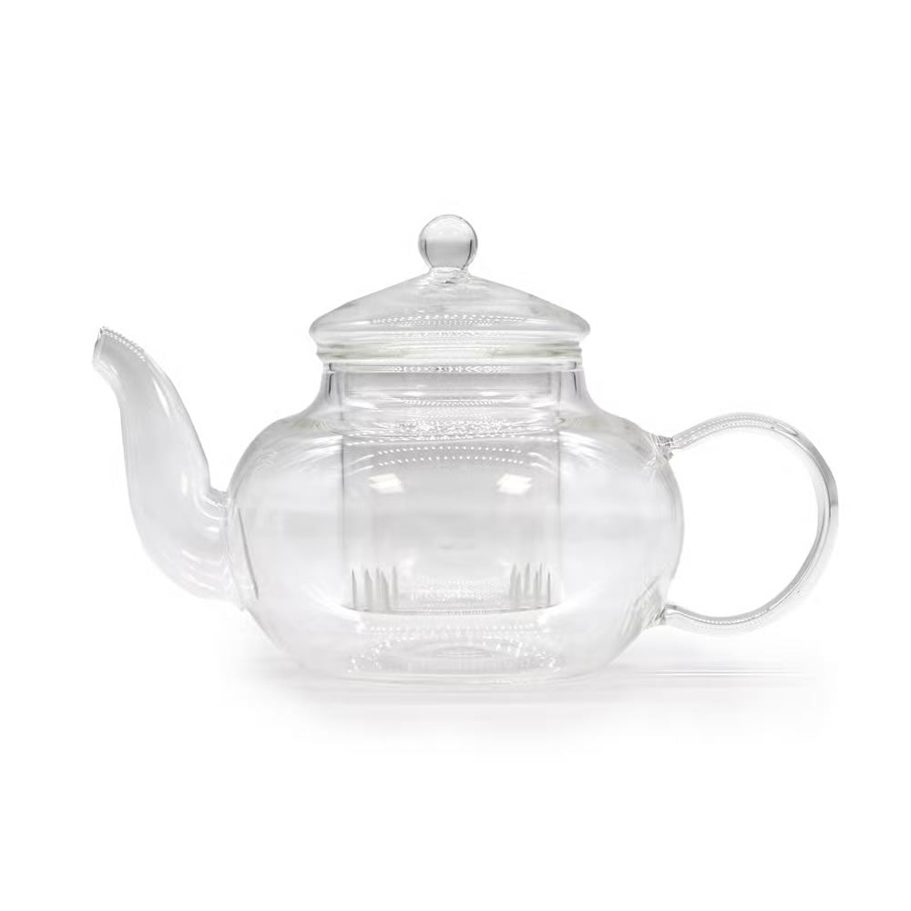 Clear glass teapot with a lid on a white background
