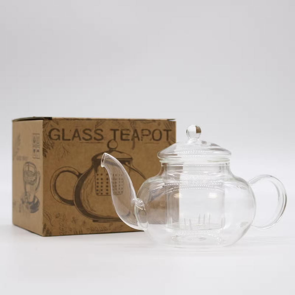 Clear glass teapot with a cardboard box labeled 'Glass Teapot' on a white background