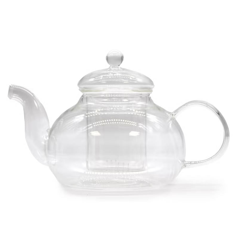 Clear glass teapot with a lid on a white background