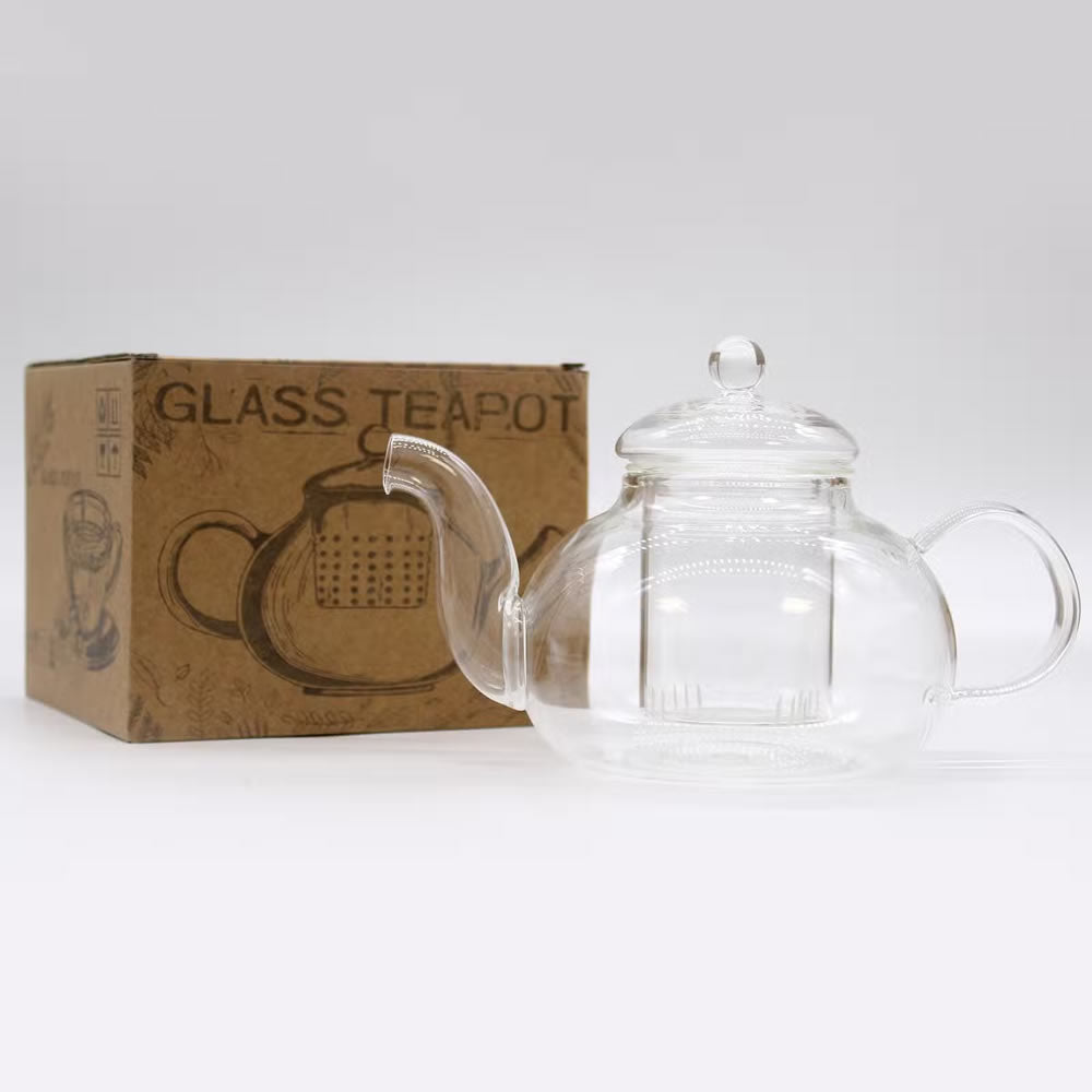 Clear glass teapot with a cardboard box labeled 'Glass Teapot' on a white background