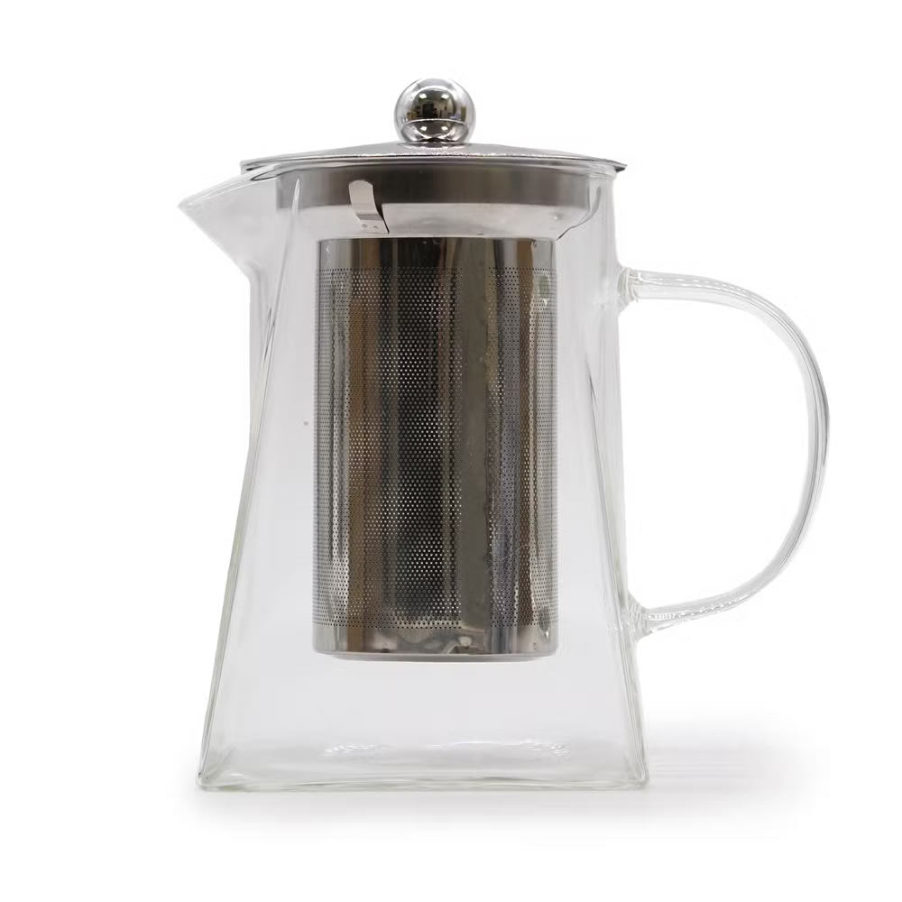 Clear glass teapot with metal infuser on a white background