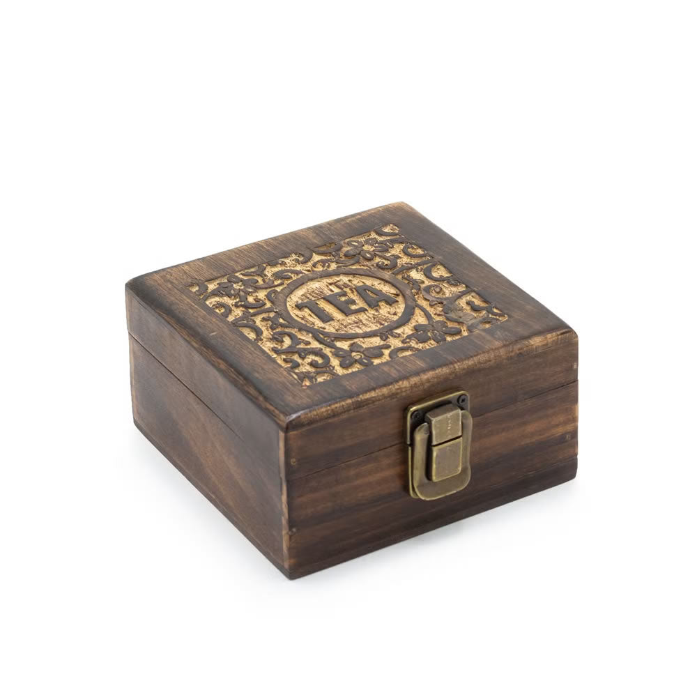 Wooden box with decorative emblem and lock on a white background