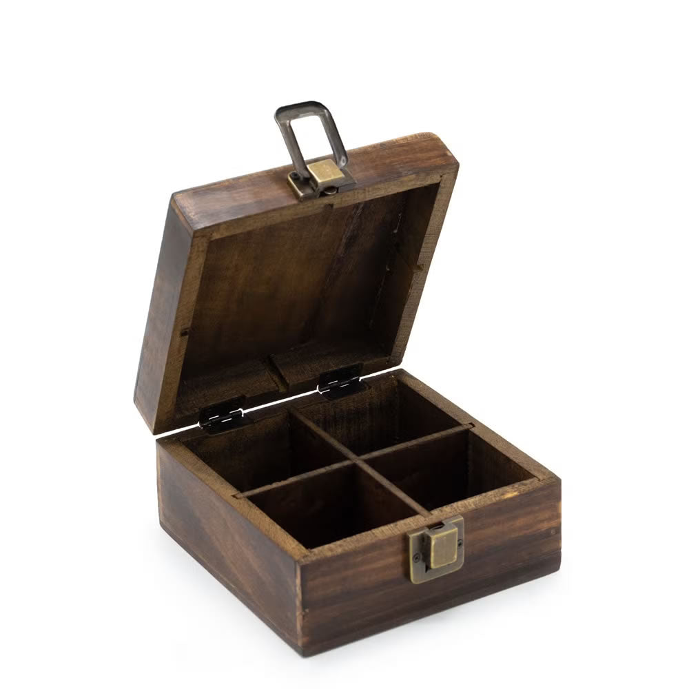 Wooden jewelry box with two compartments on a white background