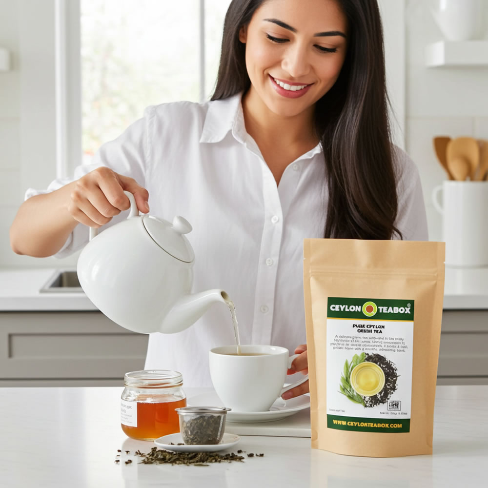 Woman pouring tea into a cup with a Pure Ceylon Green Tea package on a kitchen counter.