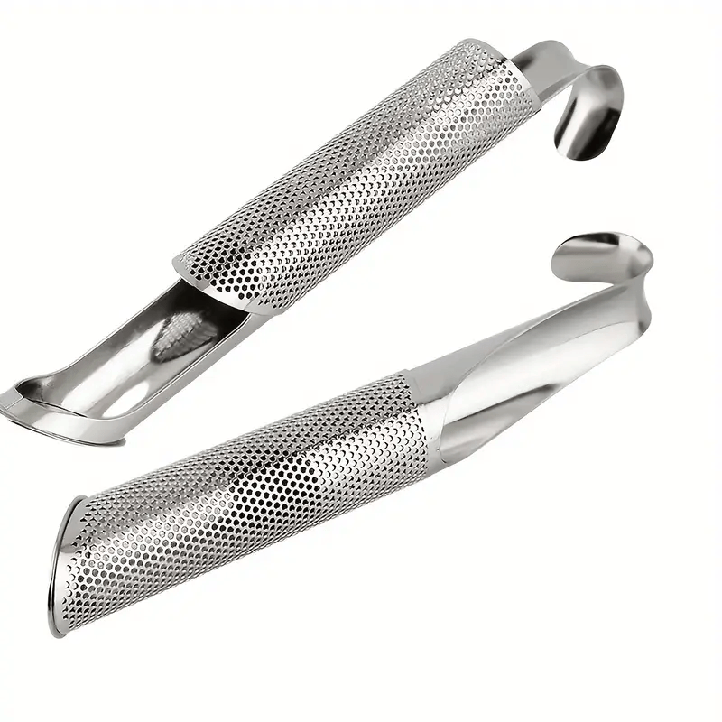 Metallic kitchen tongs with textured handles on a white background