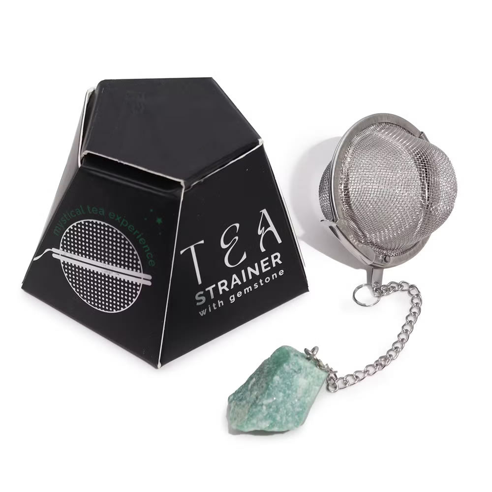 Tea strainer with gemstone and packaging on a white background
