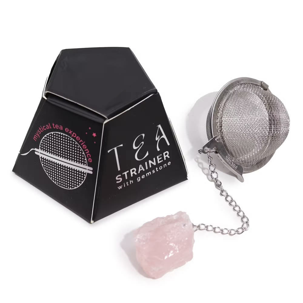 Tea strainer with gemstone and packaging on a white background